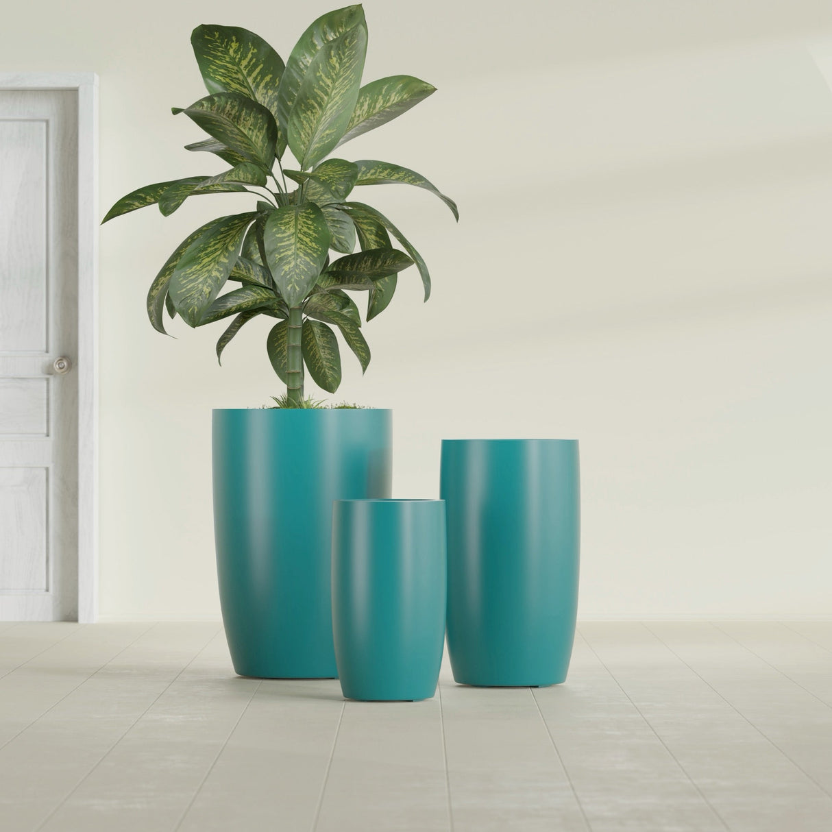 Lisbon Tall Round fiberglass planter in Satin Seafoam Green, size range, in a sunlit interior