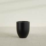 Valencia Tapered Round Planter in Matte Black, 20"D × 23"H, shown empty