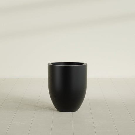 Valencia Tapered Round Planter in Matte Black, 20"D × 23"H, shown empty
