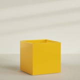 Montroy Cube Planter in Gloss Saffron, 60", shown empty