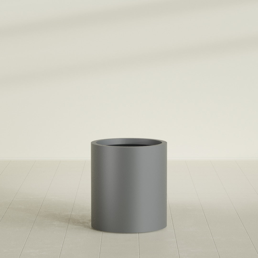 Rio Grande Cylinder Planter in Matte Gunmetal, 18"D × 20"H, shown empty