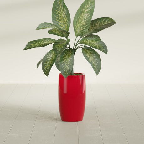 Lisbon Tall Round fiberglass planter in Gloss Red, shown planted, in a sunlit interior