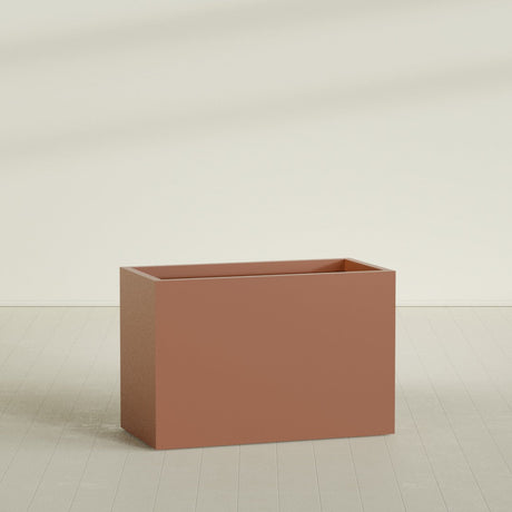 Brisbane Rectangular Planter in Matte Terra Cotta, 48"L × 24"D × 32"H, shown empty