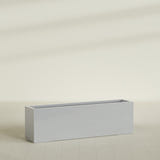 Miami Narrow Rectangular Planter in Metallic Silver, 60"L × 12"D × 18"H, shown empty