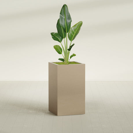 Darwin Rectangular fiberglass planter in Gloss Metallic Gold, shown planted, in a sunlit interior