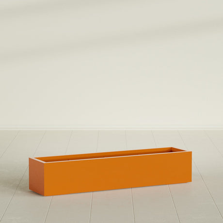 Cuba Low Rectangular Planter in Gloss Tangerine, 60"L × 14"D × 12"H, shown empty