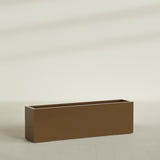 Miami Narrow Rectangular Planter in Metallic Bronze, 60"L × 12"D × 18"H, shown empty
