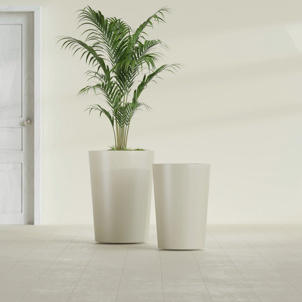 Tegel Round Tapered fiberglass planter in Satin Beige, size range, in a sunlit interior