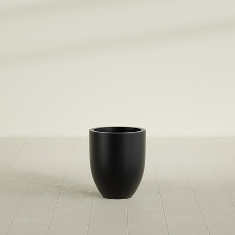 Valencia Tapered Round Planter in Matte Black, 15"D × 18"H, shown empty