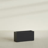 Hollywood Narrow Rectangular Planter in Matte Black, 36"L × 12"D × 24"H, shown empty