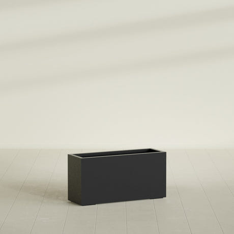 Hollywood Narrow Rectangular Planter in Matte Black, 36"L × 12"D × 24"H, shown empty