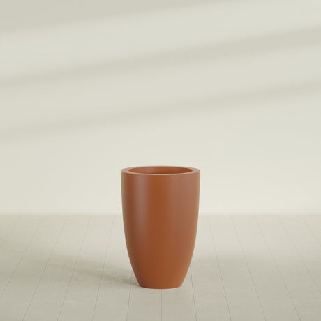 Brannan Tapered Round Planter in Matte Terra Cotta, 24"D × 35"H, shown empty
