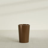 Tegel Round Tapered Planter in Metallic Bronze, 18"D × 26"H, shown empty