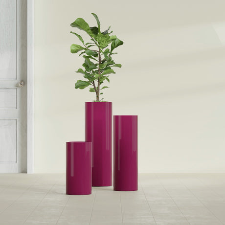 Corry Cylinder fiberglass planter in Gloss Eggplant, size range, in a sunlit interior