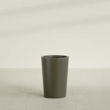 Tegel Round Tapered Planter in Matte Bronze, 18"D × 26"H, shown empty