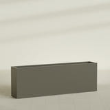 Hollywood Narrow Rectangular Planter in Matte Bronze, 72"L × 12"D × 24"H, shown empty