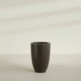 Brannan Tapered Round Planter in Matte Dark Brown, 24"D × 35"H, shown empty