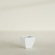 Lima Tapered Square Planter in Matte Bright White, 12", shown empty