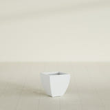 Lima Tapered Square Planter in Matte Bright White, 12", shown empty
