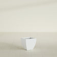 Lima Tapered Square Planter in Matte Bright White, 12", shown empty