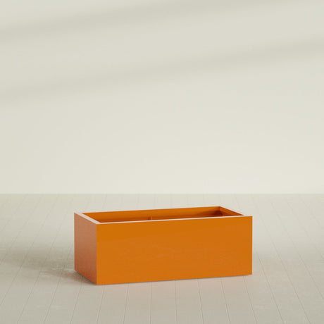 Torino Wide Rectangular Planter in Gloss Tangerine, 48"L × 24"D × 18"H, shown empty