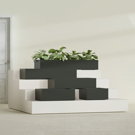 Antwerp Rectangular fiberglass planter in Matte Charcoal, size range, in a sunlit interior