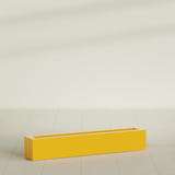 Salon Box Planter in Gloss Saffron, 48" Long, shown empty