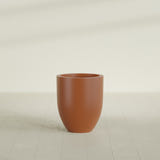 Valencia Tapered Round Planter in Matte Terra Cotta, 20"D × 23"H, shown empty