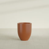 Valencia Tapered Round Planter in Matte Terra Cotta, 20"D × 23"H, shown empty