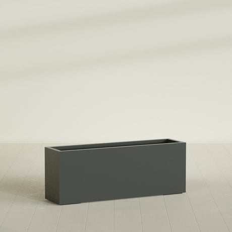 Miami Narrow Rectangular Planter in Matte Charcoal, 48"L × 12"D × 18"H, shown empty