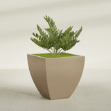 Lima Tapered Square fiberglass planter in Gloss Metallic Gold, planted, in a sunlit interior