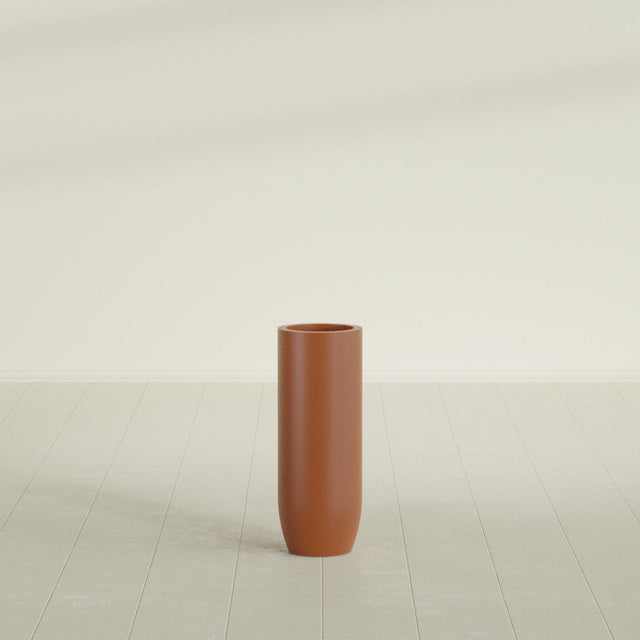 Saint Tropez Bullet Round Planter in Matte Terra Cotta, 12"D × 32"H, shown empty