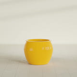 Shanghai Fishbowl Planter in Gloss Saffron, 22", shown empty