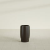 Lisbon tall round tapered fiberglass planter in Matte Dark Brown, 14 in diameter, 25 in high, shown empty