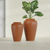 Barà Jar fiberglass planter in Matte Terra Cotta, size range, in a sunlit interior