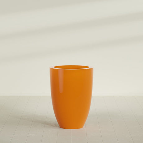 Brannan Tapered Round Planter in Gloss Tangerine, 30"D × 41"H, shown empty