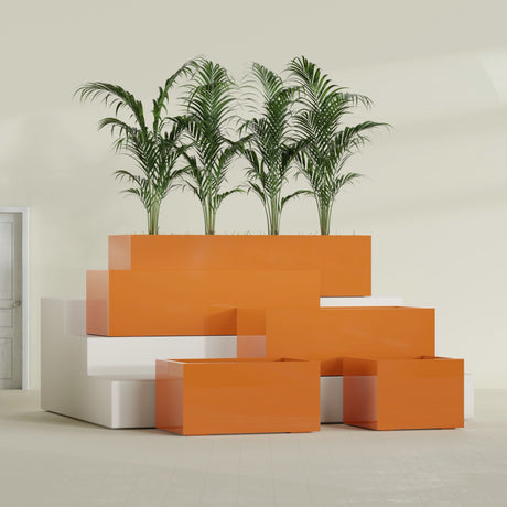 Torino Wide Rectangular fiberglass planter in Gloss Tangerine, size range, in a sunlit interior