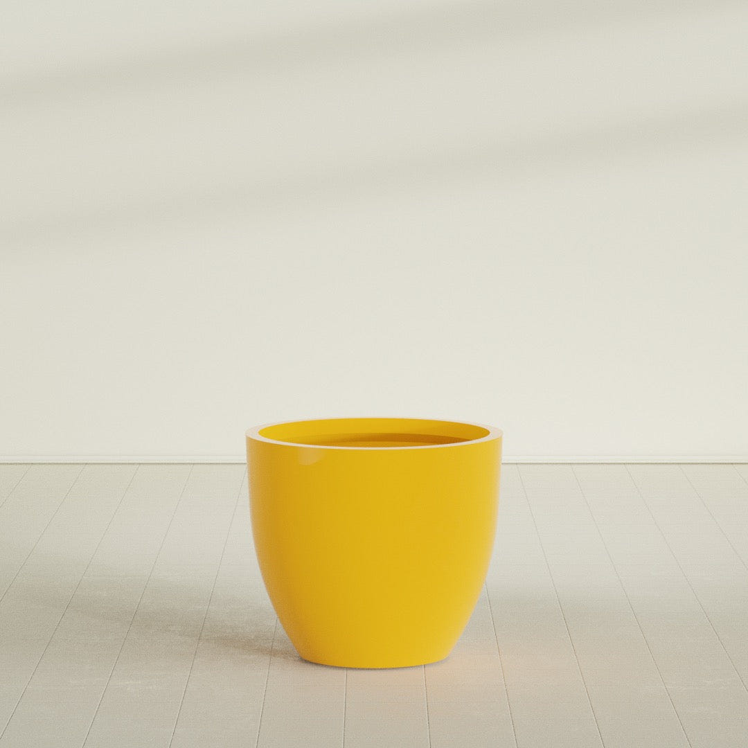 Wannsee Round Planter in Gloss Saffron, 39"D × 34"H, shown empty