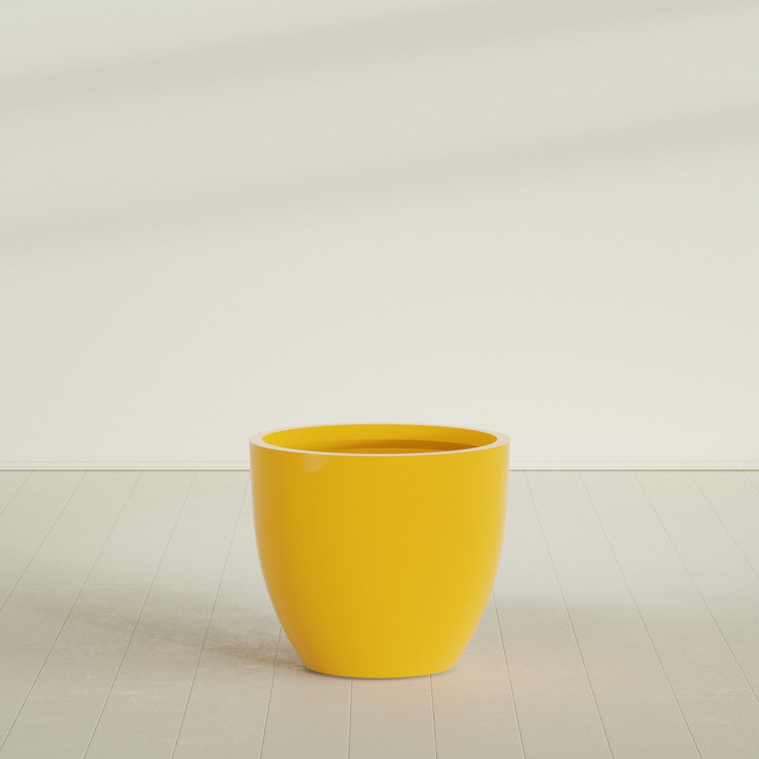 Wannsee Round Planter in Gloss Saffron, 39"D × 34"H, shown empty
