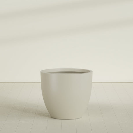 Wannsee Round Planter in Satin Beige, 44"D × 39"H, shown empty