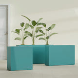 Milano Narrow Rectangular fiberglass planter in Satin Seafoam Green, shown planted, in a sunlit interior