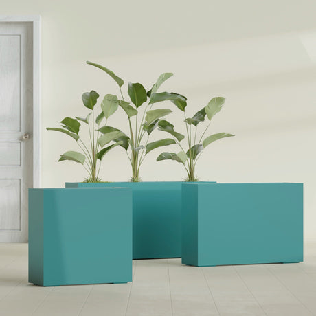 Milano Narrow Rectangular fiberglass planter in Satin Seafoam Green, shown planted, in a sunlit interior