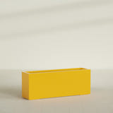 Miami Narrow Rectangular Planter in Gloss Saffron, 48"L × 12"D × 18"H, shown empty
