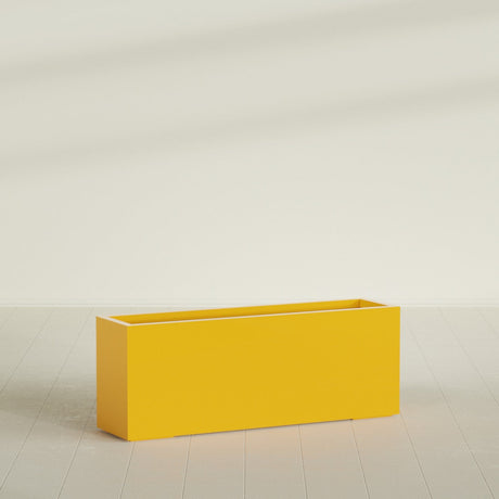 Miami Narrow Rectangular Planter in Gloss Saffron, 48"L × 12"D × 18"H, shown empty