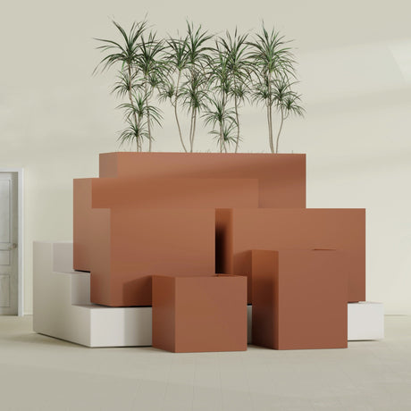 Brisbane Rectangular fiberglass planter in Matte Terra Cotta, size range, in a sunlit interior