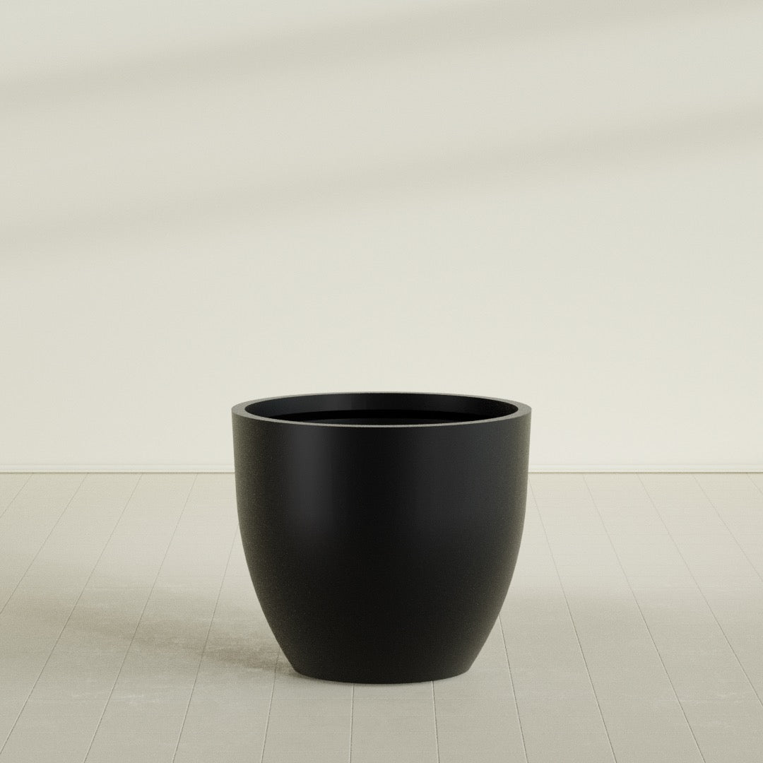 Wannsee Round Planter in Matte Black, 44"D × 39"H, shown empty