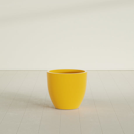 Wannsee Round Planter in Gloss Saffron, 27"D × 24"H, shown empty