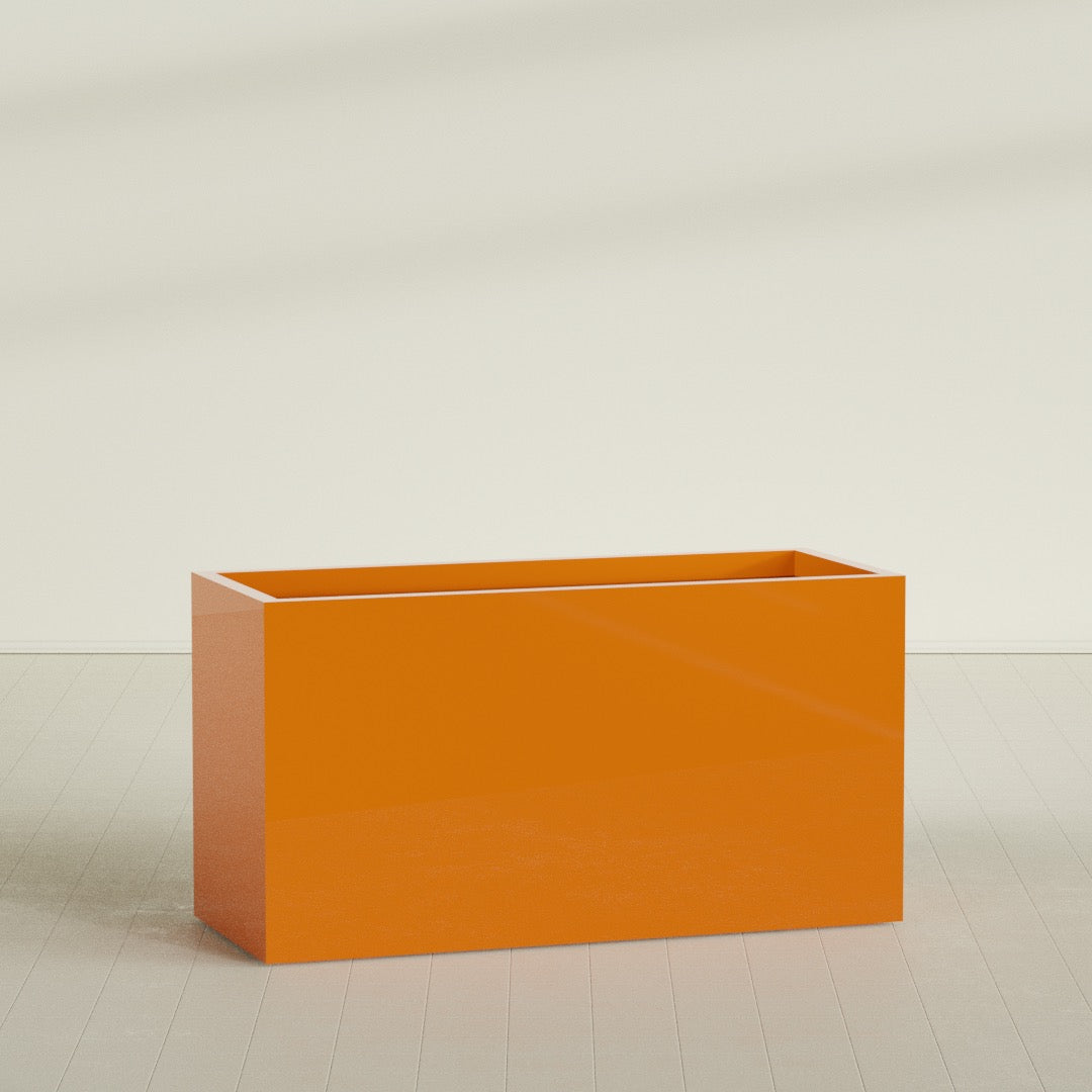Brisbane Rectangular Planter in Gloss Tangerine, 60"L × 24"D × 32"H, shown empty