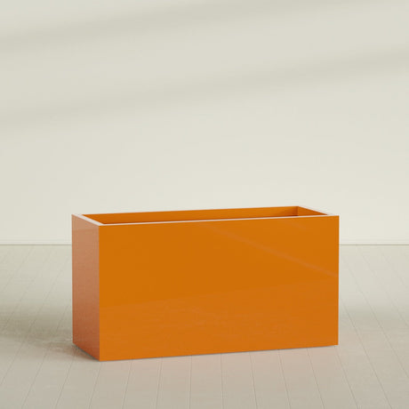 Brisbane Rectangular Planter in Gloss Tangerine, 60"L × 24"D × 32"H, shown empty