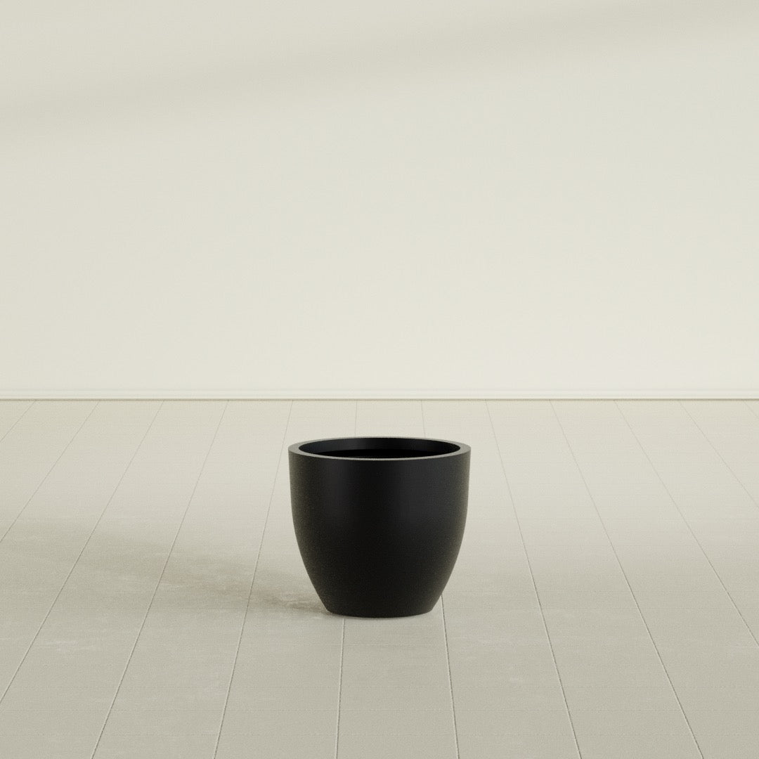 Wannsee Round Planter in Matte Black, 22"D × 19"H, shown empty